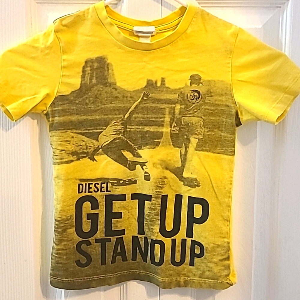 Diesel brand Size 5 boys Tee. Yellow with black print.